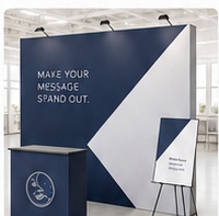 Signs and displays mockup featuring a generic branded backdrop and event display graphics.